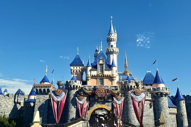 Disneyland's iconic Sleeping Beauty Castle dressed up for Disneyland's 70th