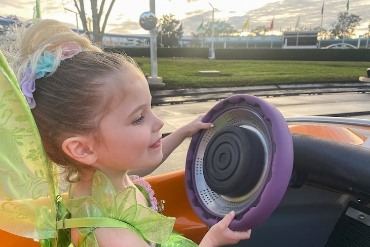Even Tinker Bell gets in the act at Tomorrowland Speedway!