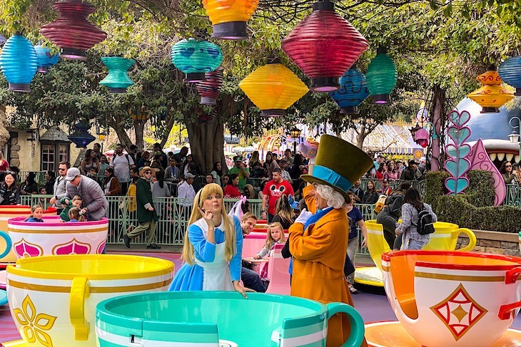 Where else but Disneyland would you find Alice and Mad Hatter working an attraction?