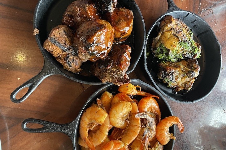 Grilled Chicken with Polynesian-inspired Chimichurri Sauce, Wood-fire Grilled Teriyaki Beef, Spicy Peel-n-Eat Shrimp