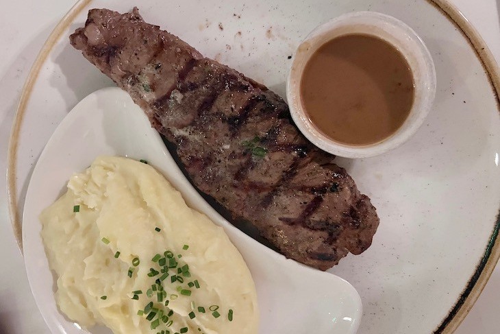 New York Strip with Garlic Mashed Potatoes and Wild Mushroom Sauce