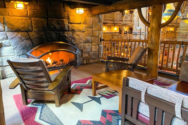 Cozy alcove seating around the fireplace can be found just off the lobby