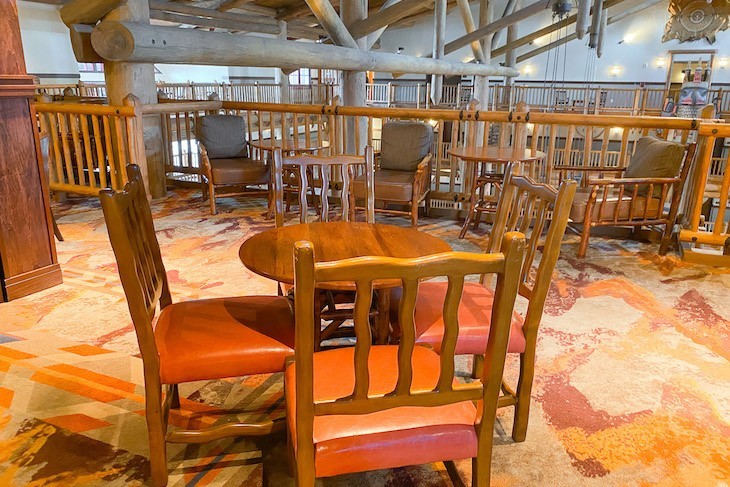 Tables overlooking the lobby below at Old Faithful Club