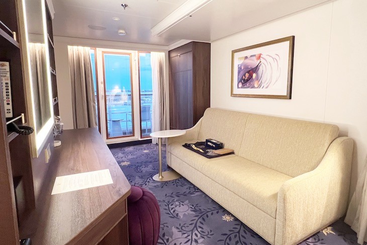 Concierge Family Oceanview Stateroom with Verandah seating area